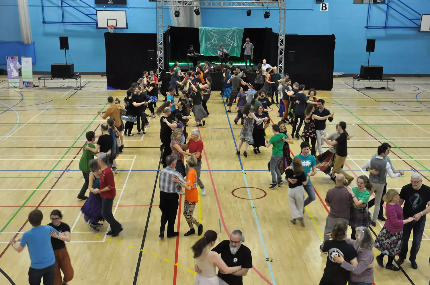 People dancing at a contra workshop.